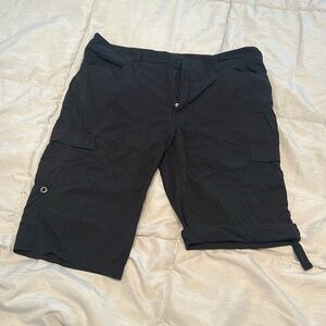 Patagonia black trail hiking shorts. Adjustable length with side buttons.